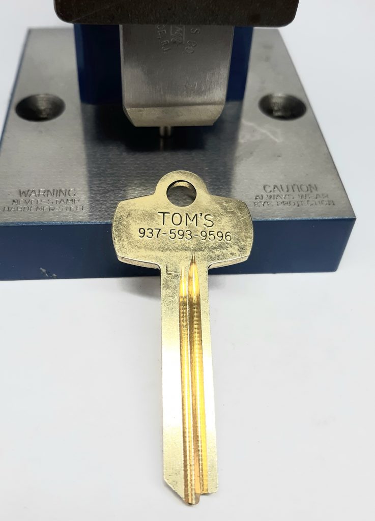 custom key stamp for locksmiths